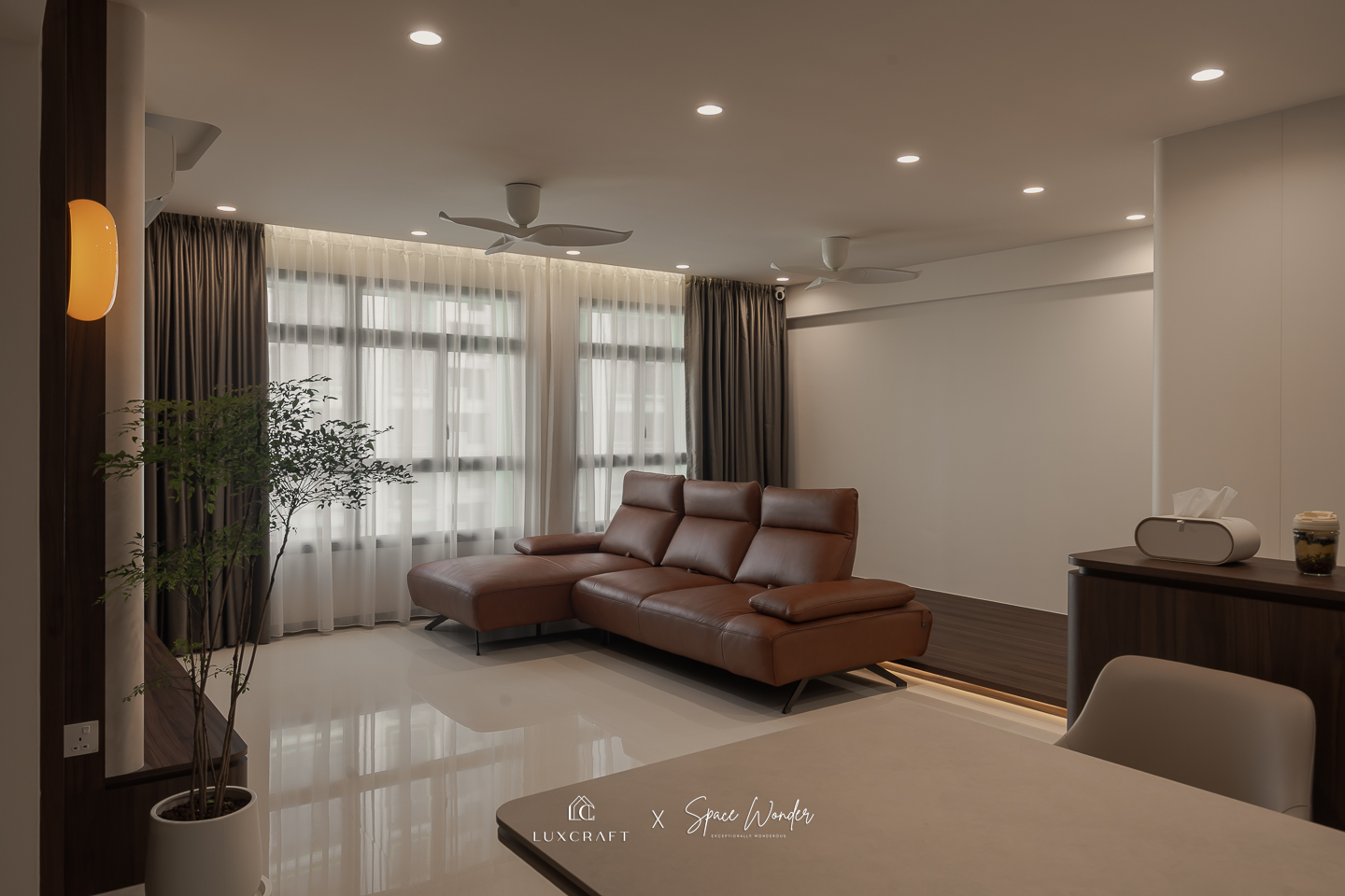 Beautifully lit modern living room by LuxCraft